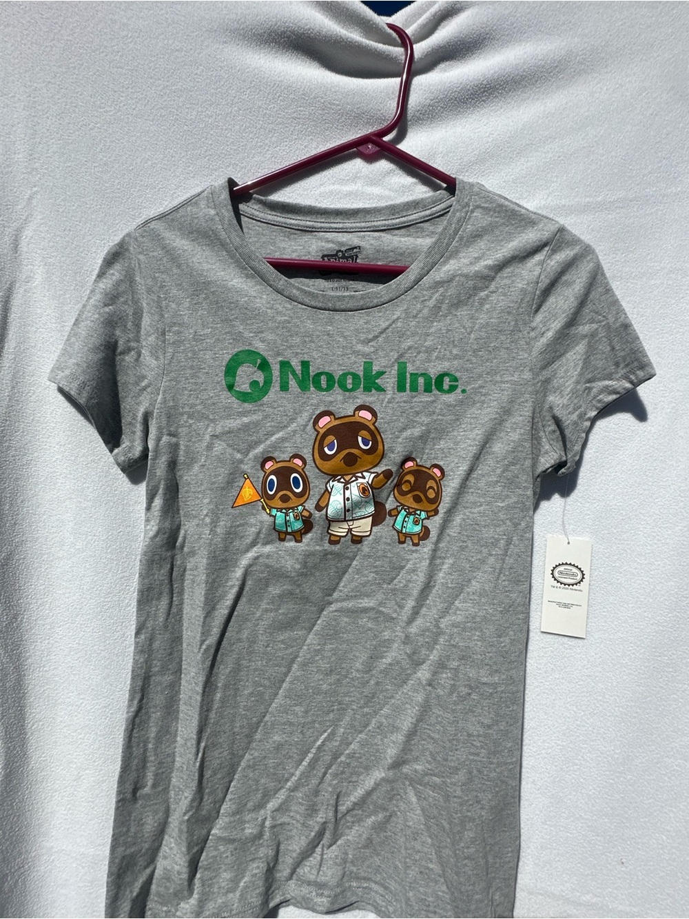 Nintendo Gray Tee with Green Nook Inc. Logo and Tom Nook Family Graphic